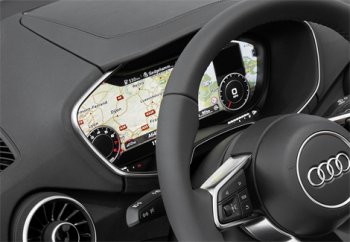 В Audi TT вместо приборной панели стоит сенсорный дисплей В Audi TT вместо приборной панели стоит сенсорный дисплей